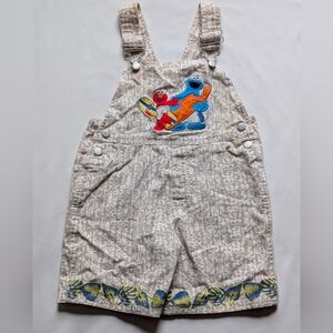Sesame Street Tan and Blue Overalls Playful Design